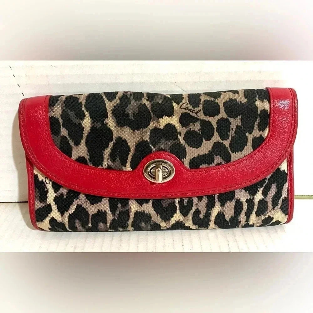 Coach leopard park ocelot print with red leather trim slim envelope fold wallet